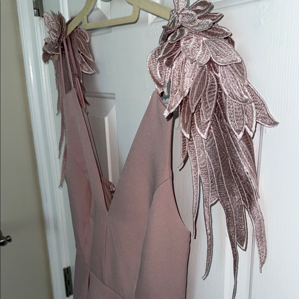 Elegant Mauve Sleeveless Romper with Feather Wings Details